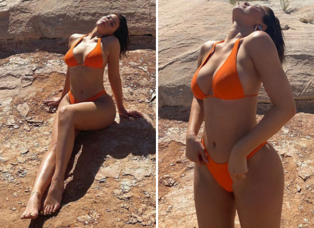 Kylie Jenner soaks in the sun in tiny orange bikini during her vacation at Canyon Point