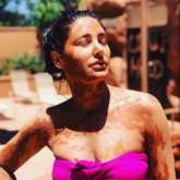 Nargis Fakhri soaks in the sun in pink bikini while enjoying mud bath