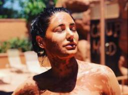 Nargis Fakhri soaks in the sun in pink bikini while enjoying mud bath