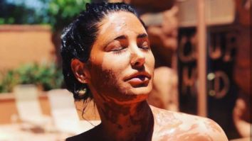 Nargis Fakhri soaks in the sun in pink bikini while enjoying mud bath