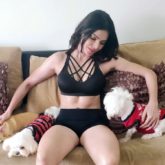 Sherlyn Chopra sizzles in a bikini; shares a video with her adorable dogs
