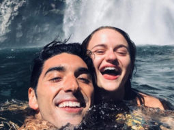 The Kissing Booth 2 stars Joey King and Taylor Zakhar Perez swim under a waterfall during their getaway with friends