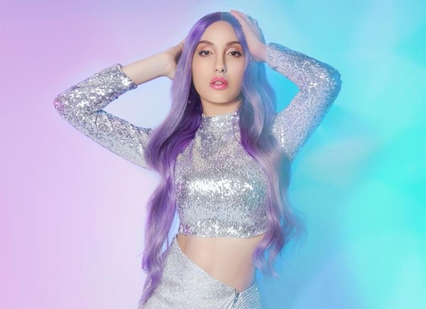 Nora Fatehi stuns in sparkly silver co-ord set and her purple hair in 'Nach Meri Rani' poster