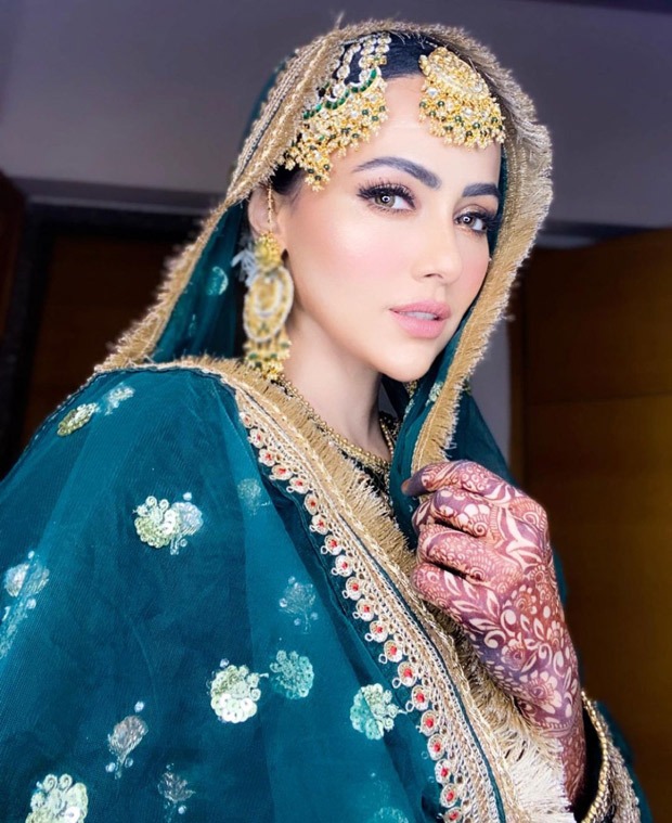 Sana Khan’s teal green and golden gharara is a must-add in your trousseau