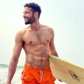 Siddhant Chaturvedi flaunts his abs as he takes a dip in the sea; asks followers to pay attention to his poem as well