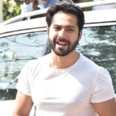 Dulha Varun Dhawan arrives at the wedding venue in Alibaug dressed in a classic white t-shirt and denims