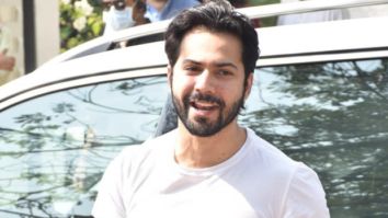 Dulha Varun Dhawan arrives at the wedding venue in Alibaug dressed in a classic white t-shirt and denims