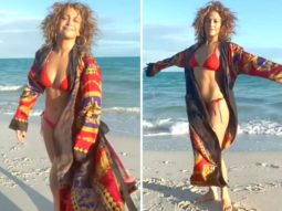 Jennifer Lopez flaunts her toned body as she raises the temperature in a red bikini