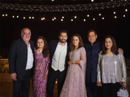 Newlyweds Varun Dhawan and Natasha Dalal strike a pose with their parents at the after-party 