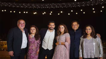 Newlyweds Varun Dhawan and Natasha Dalal strike a pose with their parents at the after-party 