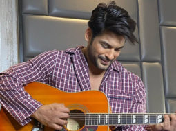 Sidharth Shukla poses with a guitar while flashing his million-dollar-smile leaving the fans smitten!