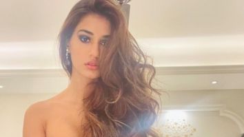 Disha Patani looks like a sultry beauty dressed in a bodycon dress with a thigh-high slit
