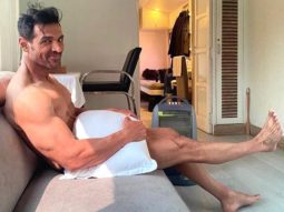 John Abraham poses with JUST a pillow, leaves his fans drooling!