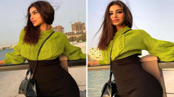 Mouni Roy’s mini black dress with knitted sweater is effortless style at best