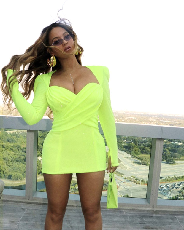Beyoncé makes a strong summer statement in neon Balmain mini dress and Christian Louboutin pumps