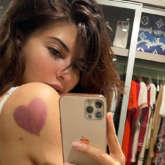 Jacqueline Fernandez poses in a lacy bra to show her new found love for heart-shaped cupping therapy