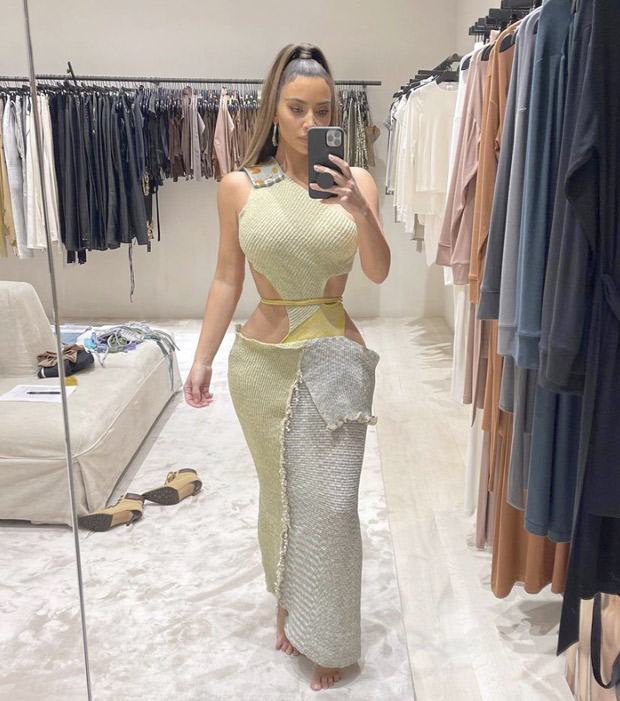 Kim Kardashian's unsual cut-out vacation dress is gaining a lot of attention