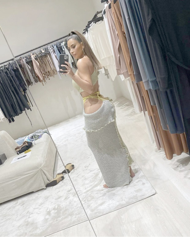 Kim Kardashian's unsual cut-out vacation dress is gaining a lot of attention