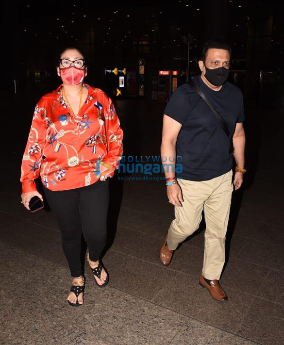 photos govinda and wife sunita ahuja snapped at the airport 1