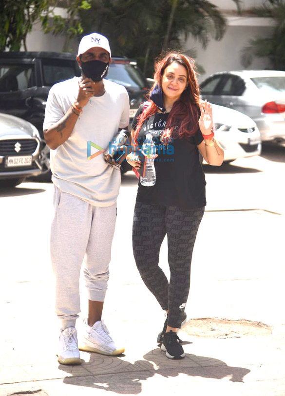 photos remo dsouza snapped with his wife lizelle dsouza at his office in andheri 2