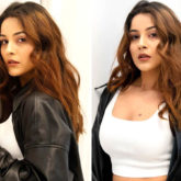 Shehnaaz Gill dons crop top and jeans with leather jacket as she returns from Canada after wrapping Honsla Rakh