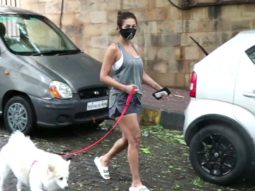 Malaika Arora spotted with her pet at her residence in Bandra