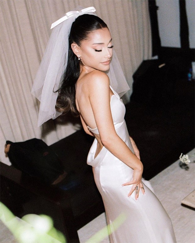 Ariana Grande stuns as a beautiful bride in Audrey Hepburn inspired Vera Wang backless gown during intimite wedding with Dalton Gomez