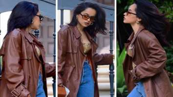 Becky G stuns in chic snake print top and denims, pairs them with brown overcoat and heels