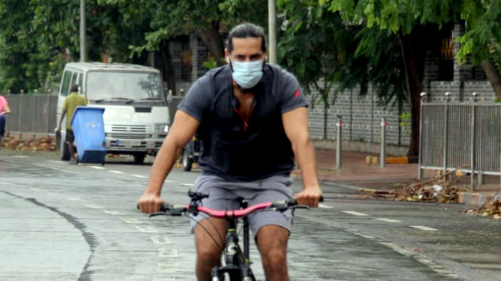Dino Morea spotted riding a bicycle in Bandra