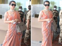 Kangana Ranaut leaves for Manali after testing negative for COVID-19; dons orange saree at the airport