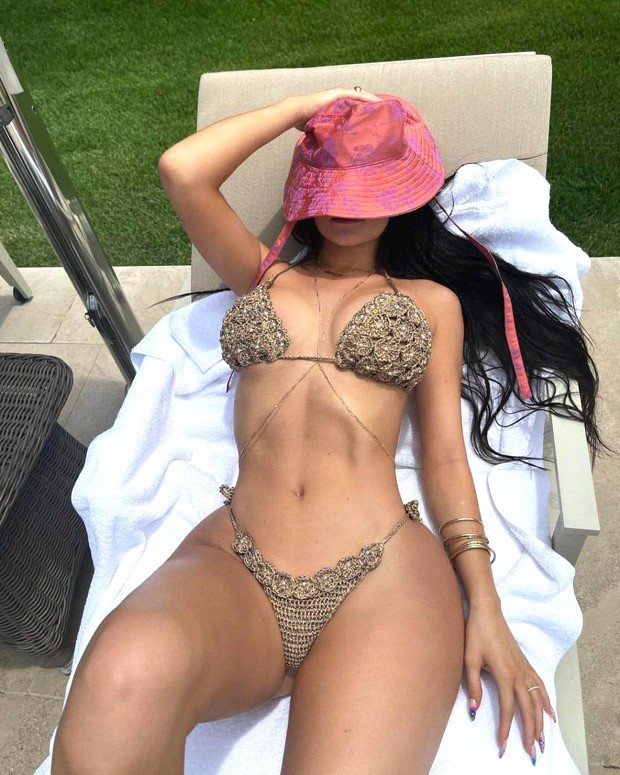 Kylie Jenner flaunts her curves in sexy gold knitted bikini Kylie Jenner flaunts her curves in sexy gold knitted bikini