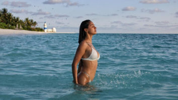 Disha Patani sets the temperature soaring skimpy white bikini in this beach photo