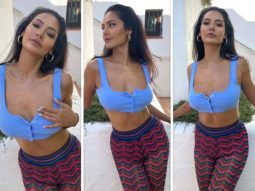 Esha Gupta looks gorgeous in pastel blue crop top and multi-coloured pants