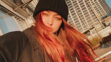 Gigi Hadid flaunts her red hair in a glowing selfie