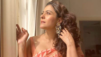 Kajol looks like a beautiful ray of sunshine in a printed orange saree