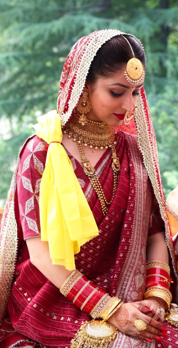 Yami Gautam wore her mother's 33-year-old traditional maroon silk saree for her wedding