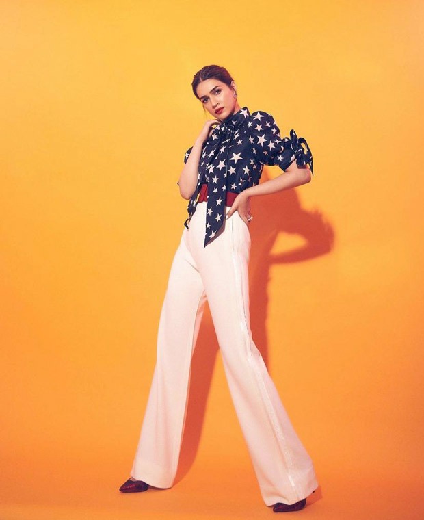 Kriti Sanon dons printed shirt and high waisted pants by Naeem Khan for Mimi promotions Kriti Sanon dons printed shirt and high waisted pants by Naeem Khan for Mimi promotions
