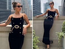 Lady Gaga makes a statement in a figure-hugging black outfit with gold details