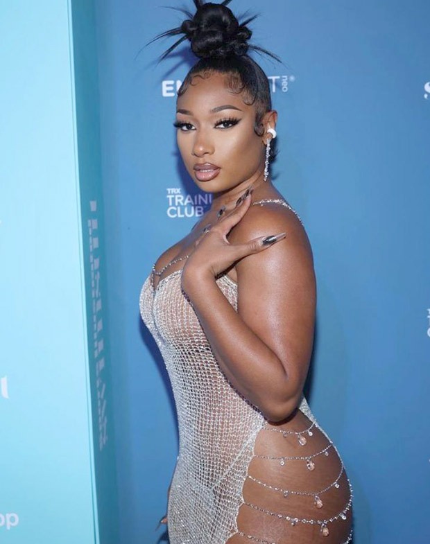 Megan Thee Stallion sets the internet ablaze in sheer crystal chain dress with waist-high slit for Sports Illustrated swimsuit launch