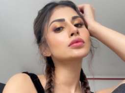 Mouni Roy aces soft glam look, ties her hair in French braids