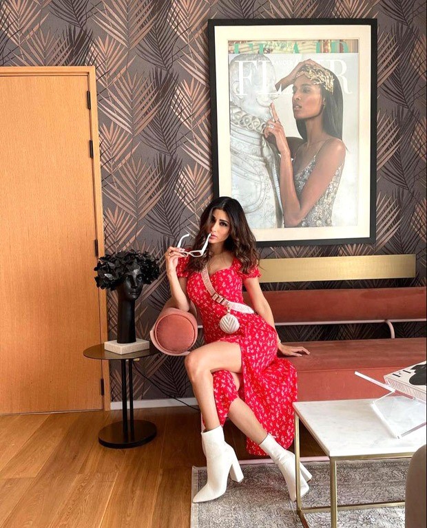 Mouni Roy pairs a red thigh-high slit midi dress with Louis Vuitton mini cross body bag worth Rs. 2.37 lakh Mouni Roy pairs a red thigh-high slit midi dress with Louis Vuitton mini cross body bag worth Rs. 2.37 lakh
