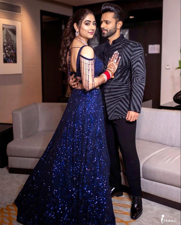 Rahul Vaidya keeps it dapper in Abu Jani & Sandeep Khosla; Disha Parmar dons blue embellished lehenga for after party