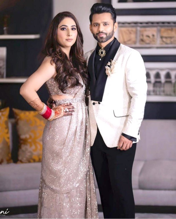 Rahul Vaidya keeps it sharp in black and white suit, Disha Parmar dons shimmery sareer from Dolly J studio for their wedding reception
