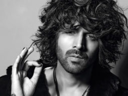 Kartik Aaryan flaunts black nail polish, tattoo, and a messy hair for Dabboo Ratnani’s annual calendar