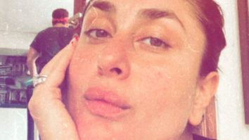 Kareena Kapoor Khan sneaks in an unaware Saif Ali Khan into her selfie as he works out