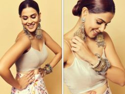 Genelia Deshmukh makes a statement in a specially printed skirt and cowl neck satin top
