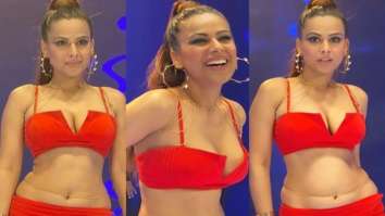 Nia Sharma makes a statement in a bold red outfit as she flaunts her toned midriff