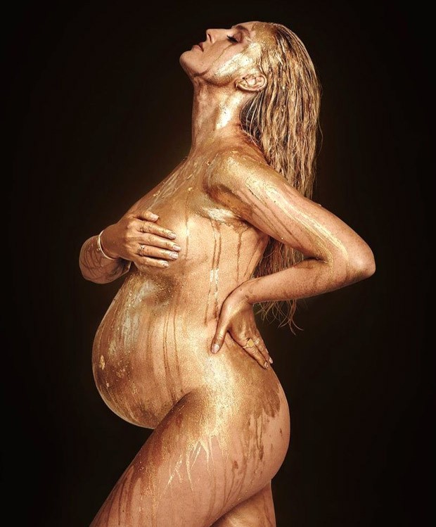 Perrie Edwards flaunts her baby bump in nude maternity photoshoot