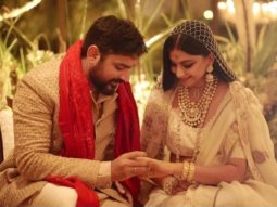 Rhea Kapoor shares her first wedding picture with her husband Karan Boolani donning ivory Anamika Khanna lehenga