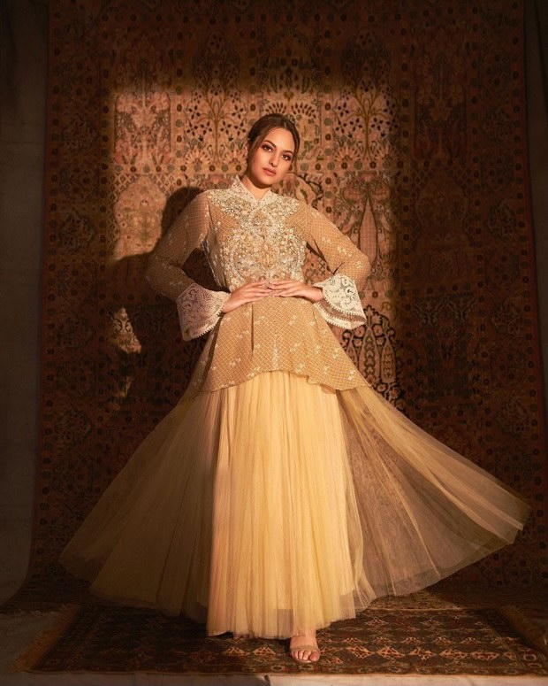 Sonakshi Sinha looks breathtaking in beige thread work ensemble cape and skirt by Ritu Kumar worth Rs.36,900
